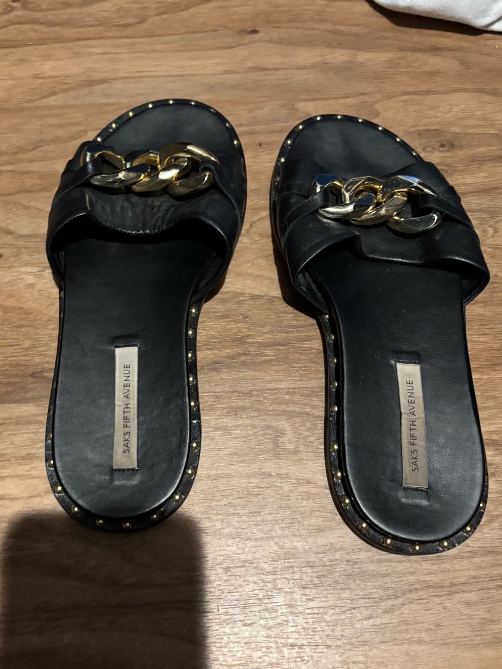 Saks Fifth Avenue Black Leather Slides with Gold Chain
